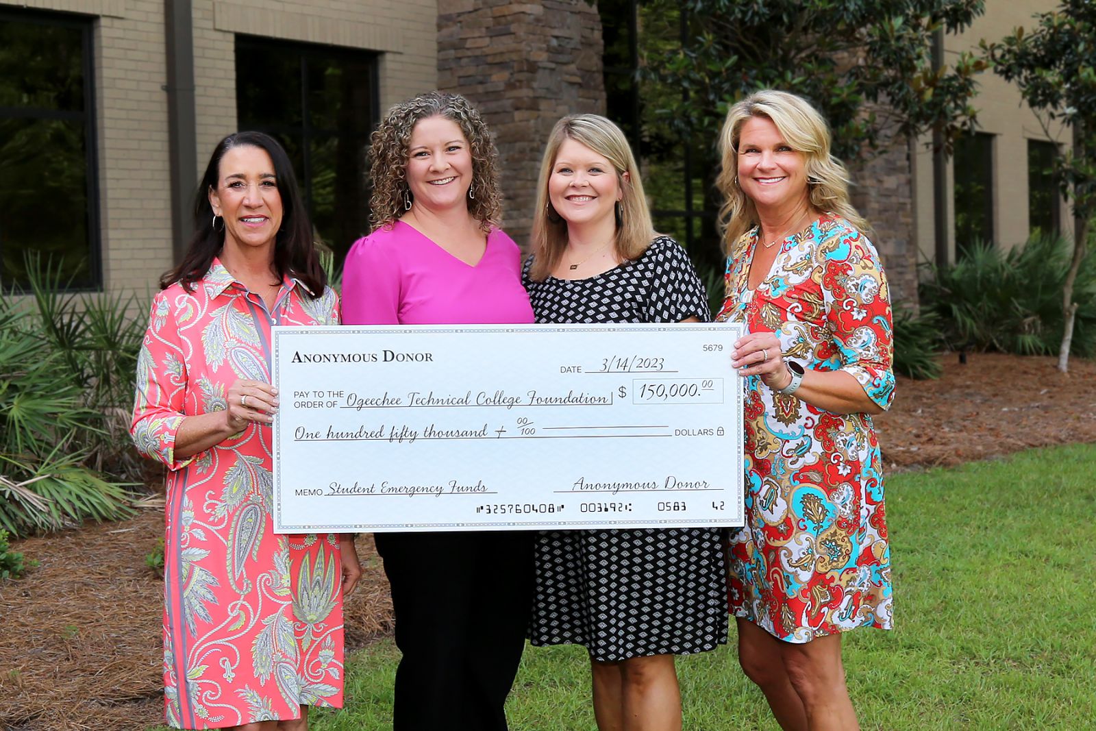 Michelle Davis, Christy Rikard, Christina Harrell, and President Lori Durden with anonymous check donation.