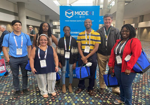 Students together at MODEX event