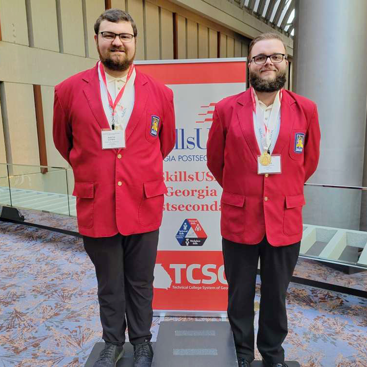 Justin Clenny and Dalton Flanders posing as Gold Medal Recipients at SkillsUSA Competition
