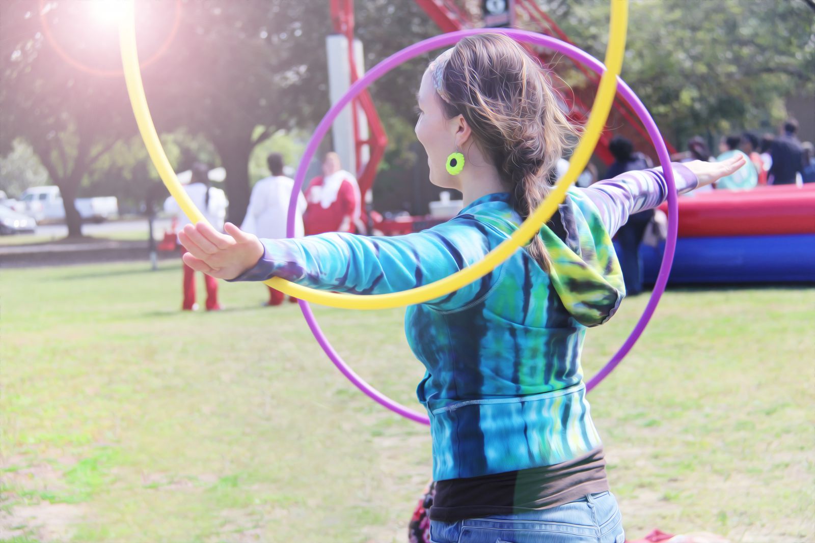 Student playing with hoola hoop at Spring Fling