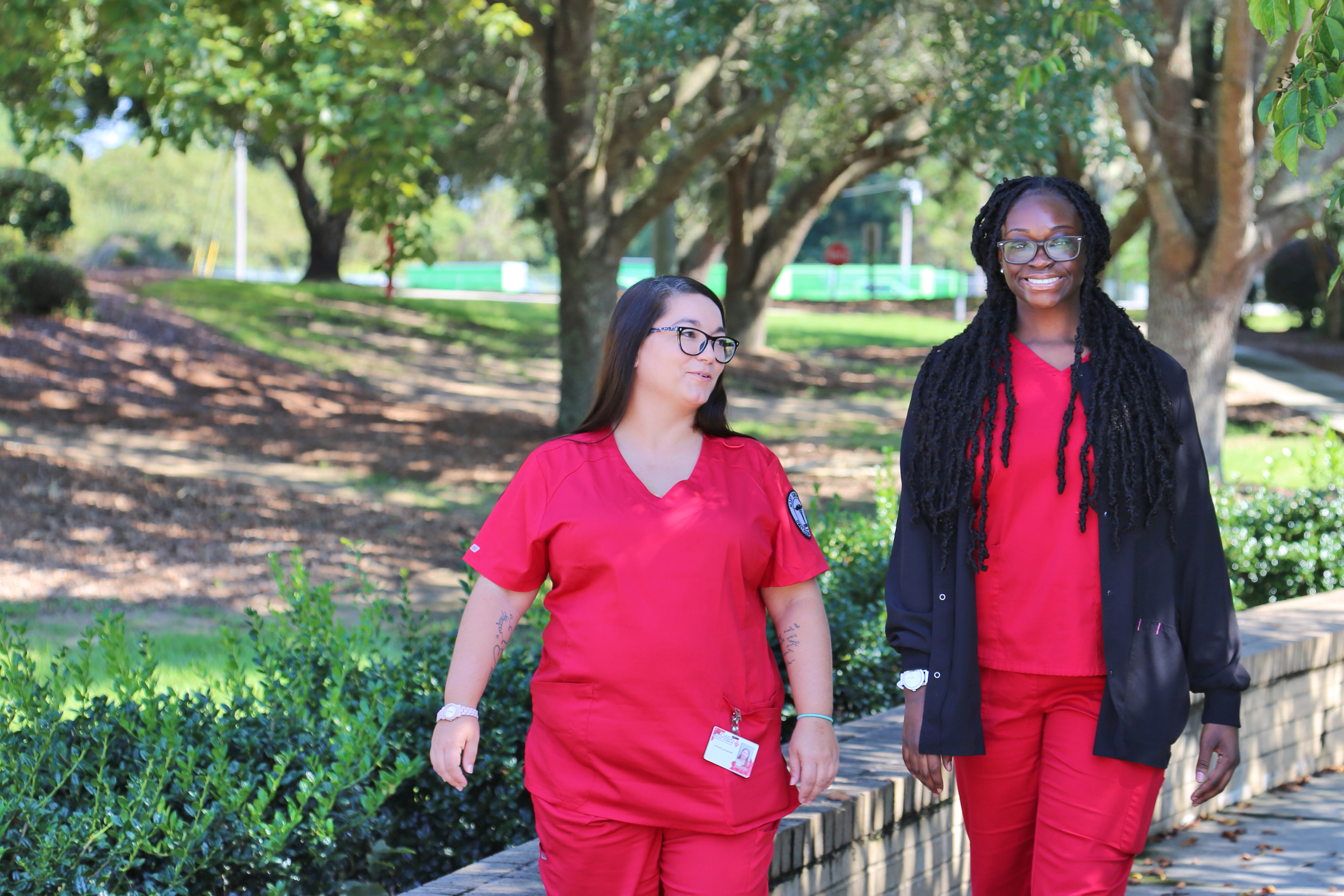 Medical Assisting Students walking through campus