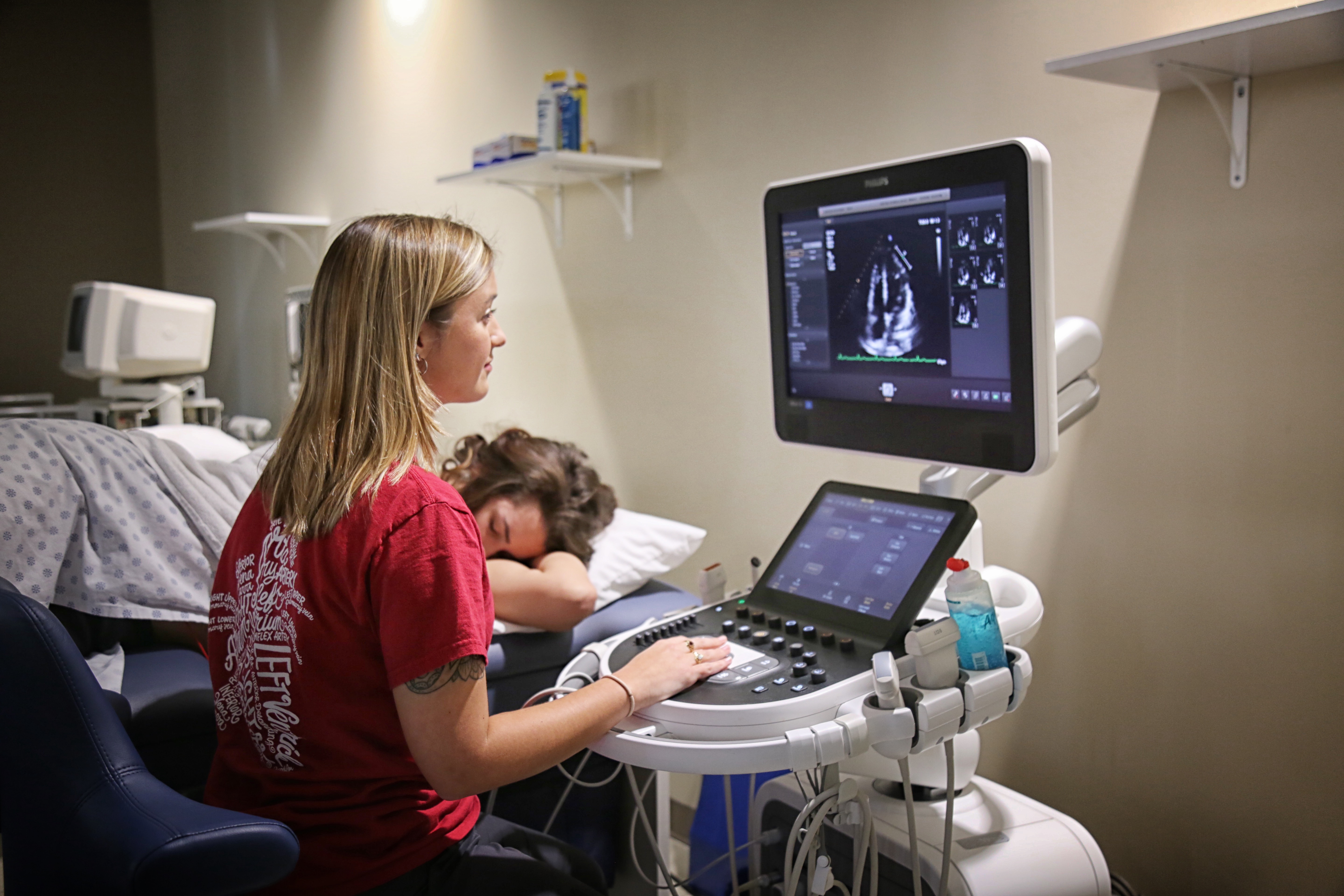 OTC DMS/Echocardiography student practing an ultra sound