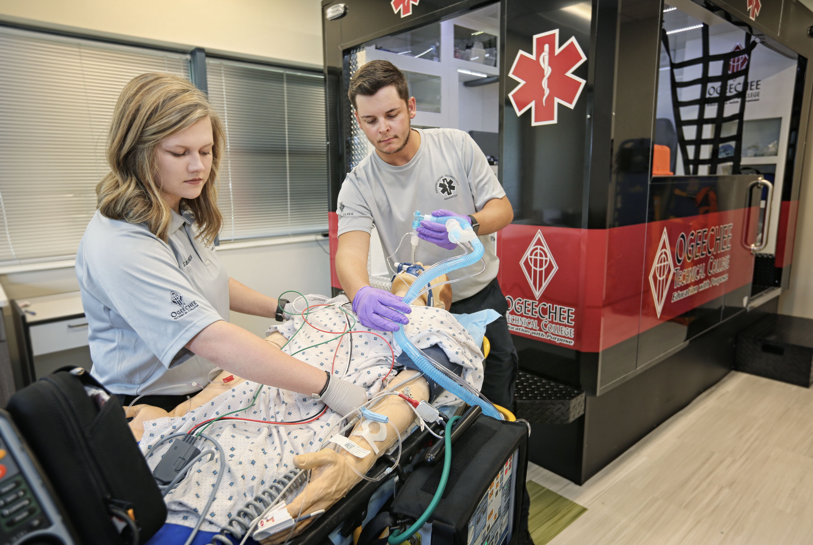 OTC Paramedicine Students with ambulance Simulator