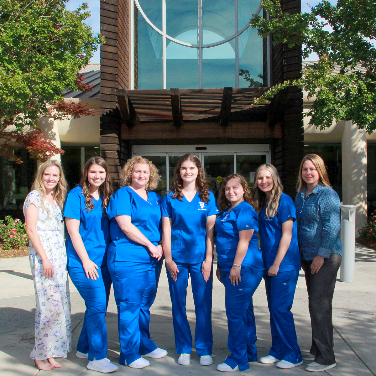 OTC Vet Tech students posing together before the start of the 2023 Pinning Ceremony